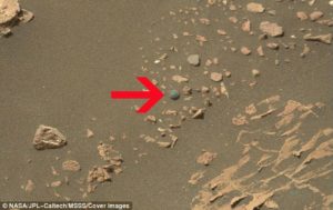strange spheres and huge tower spotted on surface of mars