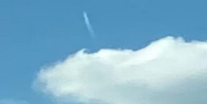 ufo caught on cam coming out of cloud