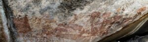 archeologists discover ancient rock drawings of strange humanoid beings