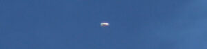 metallic disc ufo photographed during air show