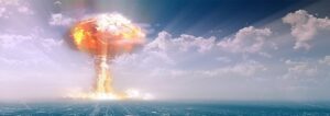 how far away would one need to be to survive a nuclear blast