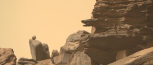 balancing rock and stone snake head seen in Mars photo