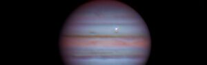 rock slams into Jupiter creating bright impact flash