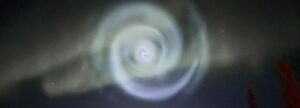 strange blue spiral lights up night sky over Alaska