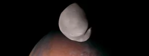 space probe takes 1st hi res photos of mars moon Deimos