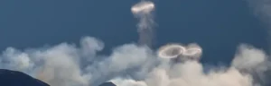 mysterious smoke rings photographed above mount etna